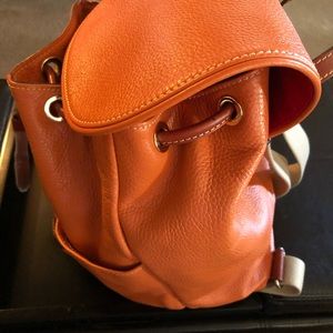 Beautiful orange backpack would make the perfect gift!